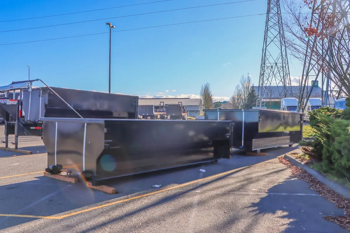 Roll-off dumpster ready for waste disposal at job site for Concrete Dumpster Rental in Ranson corporation